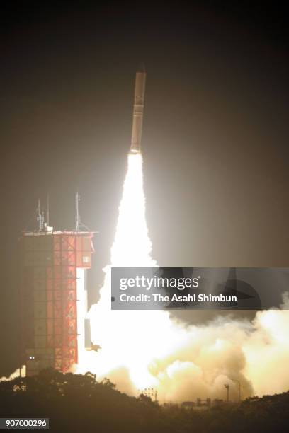 The Japan Aerospace Exploration Agency 's Epsilon-3 small solid-fuel rocket carrying radar-imaging satellite ASNARO-2 lifts off from the launch pad...