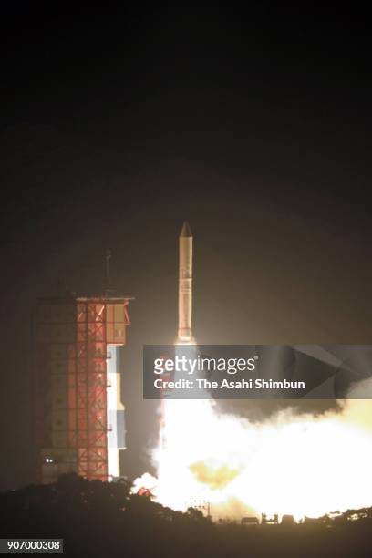 The Japan Aerospace Exploration Agency 's Epsilon-3 small solid-fuel rocket carrying radar-imaging satellite ASNARO-2 lifts off from the launch pad...