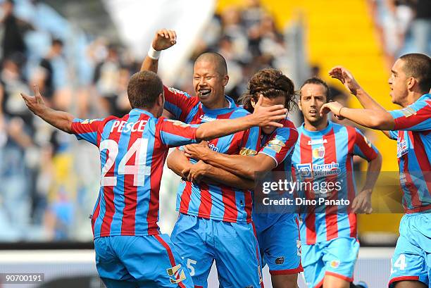 Takayuki Morimoto of Catania Calcio celebrates after scoring their first goal during the Serie A match between Udinese Calacio and Catania Calcio at...