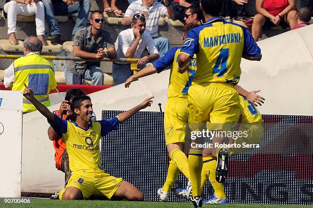 Giampiero Pinzi of Chievo Verona AC celebrates with teamates after scoring the first goal during the match between Bologna FC and Chievo Verona AC at...