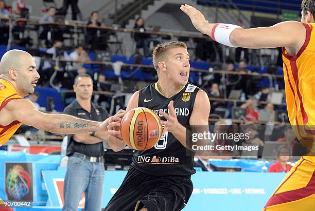 Steffen Hamann of Germany challenges Pero Antic of F.Y.R. Of Macedonia during the EuroBasket 2009 Qualifying Round Group E match between Macedonia...