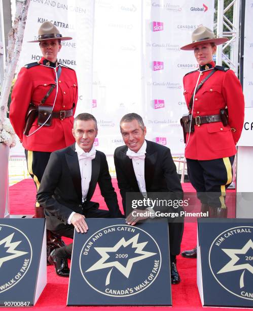 Designers Dean and Dan Caten attend Canada's Walk of Fame at The Four Season Centre of the Performing Arts on September 12, 2009 in Toronto, Canada.