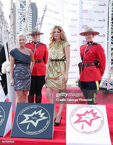 Actresses Rachel Lefevre and Elisha Cuthbert attend The Four Season Centre of the Performing Arts on September 12, 2009 in Toronto, Canada.