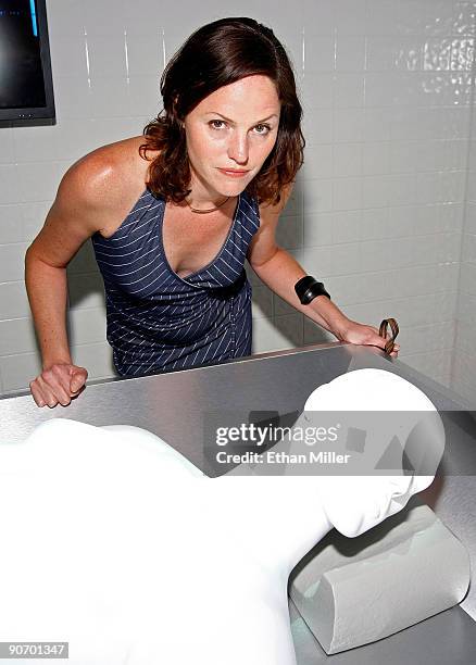 Actress Jorja Fox appears at an exhibit during the grand opening of the CSI: The Experience attraction at MGM Grand Hotel/Casino September 12, 2009...