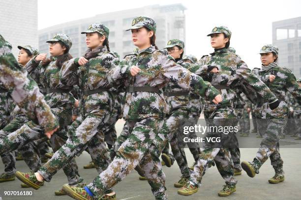 Freshman students of Hangzhou Normal University march during their two-week winter military training on January 19, 2018 in Hangzhou, Zhejiang...