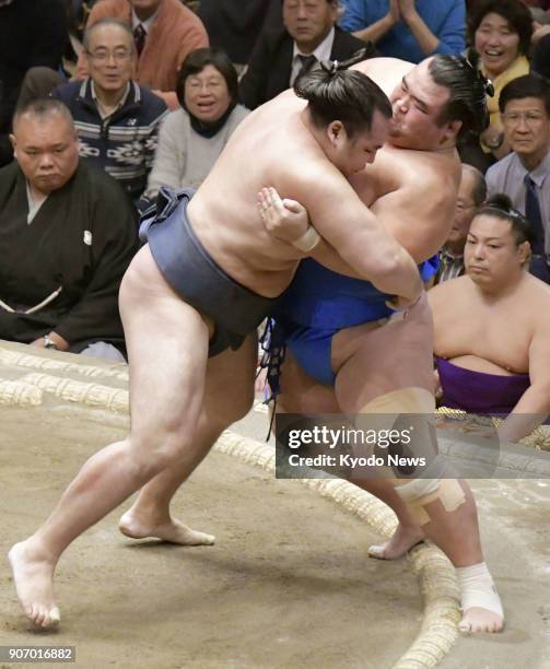 Grand champion Kakuryu defeats Kotoshogiku on the sixth day of the New Year Grand Sumo Tournament at Ryogoku Kokugikan in Tokyo on Jan. 19, 2018. His...