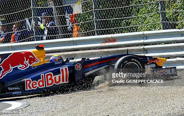Red Bull's Australian driver Mark Webber drives off the Autodromo Nazionale circuit on September 13, 2009 in Monza, during the Formula One Italian...