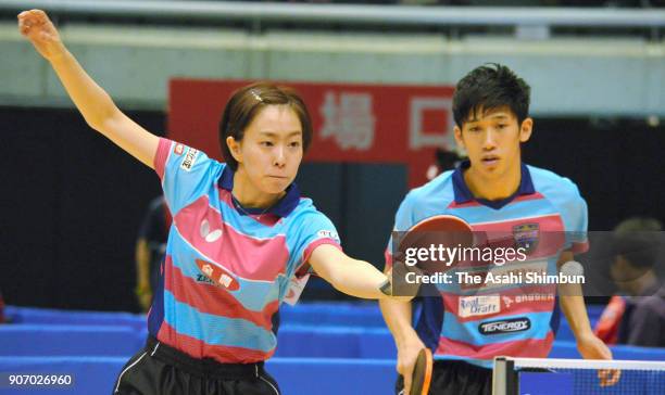 Kasumi Ishikawa and Maharu Yoshimura compete in the Mixed Doubles Round of 16 match during day three of the All Japan Table Tennis Championships at...