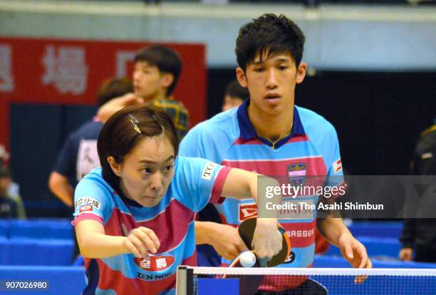 Kasumi Ishikawa and Maharu Yoshimura compete in the Mixed Doubles Round of 16 match during day three of the All Japan Table Tennis Championships at...