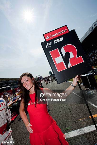 Grid girl for Sebastien Buemi of Switzerland and Scuderia Toro Rosso is seen at the Italian Formula One Grand Prix at the Autodromo Nazionale di...