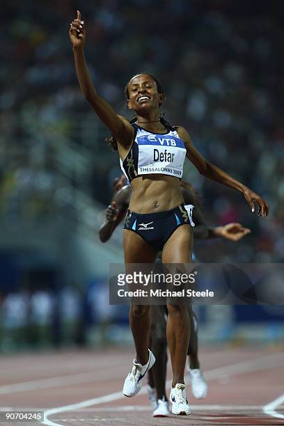 Meseret Defar of Ethiopia celebrates victory in the women's 3000m during day two of the IAAF World Athletics Final at the Kaftanzoglio Stadium on...
