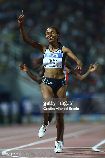 Meseret Defar of Ethiopia celebrates victory in the women's 3000m during day two of the IAAF World Athletics Final at the Kaftanzoglio Stadium on...