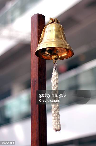 stock exchange golden bell - bell stock pictures, royalty-free photos & images