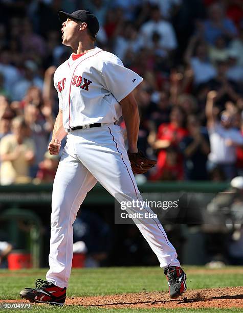 Jonathan Papelbon of the Boston Red Sox celebrates the final out against the Tampa Bay Rays on September 13, 2009 at Fenway Park in Boston,...