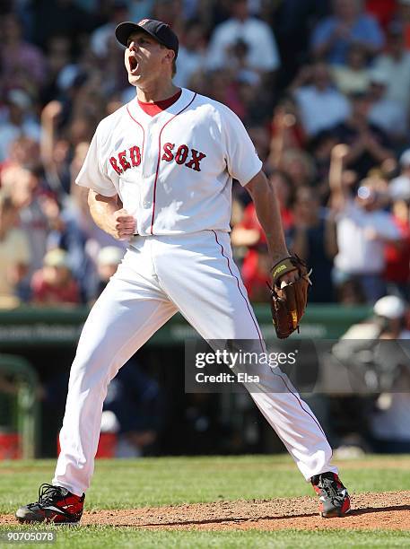 Jonathan Papelbon of the Boston Red Sox celebrates the final out against the Tampa Bay Rays on September 13, 2009 at Fenway Park in Boston,...