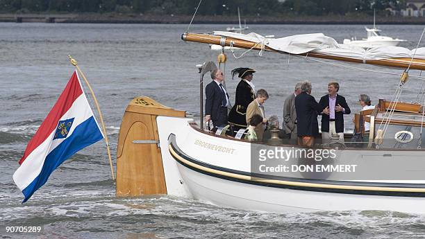 Dutch Prince Willem-Alexander sails aboard the traditional Dutch boat Groenevecht past Ellis Island on September 13, 2009 in New York Harbor. The...