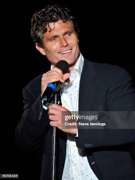 Anthony Kennedy Shriver speaks to crowd at the First Lady's Wine and Food Challenge kicking off the Audi Best Buddies Challenge at Hearst Castle on...