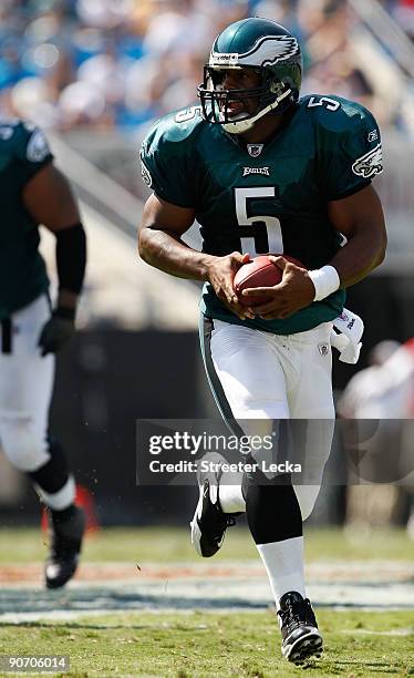 Quarterback Donovan McNabb of the Philadelphia Eagles runs with the ball in the second half of their NFL season opener against the Carolina Panthers...