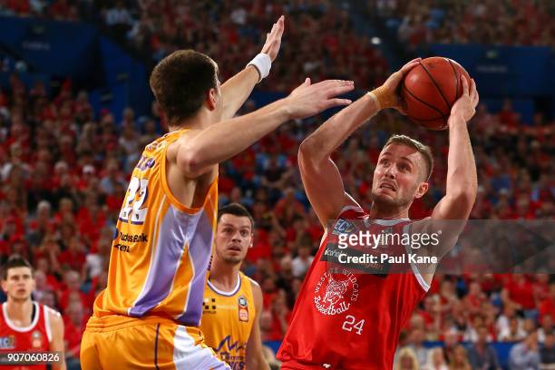 Jesse Wagstaff of the Wildcats looks to put a shot up against Dane Pineau of the Kings during the round 15 NBL match between the Perth Wildcats and...
