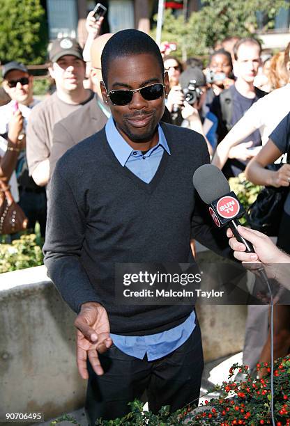 Actor/Executive Producer Chris Rock is interviewed as he arrives at the "Good Hair" screening during the 2009 Toronto International Film Festival...