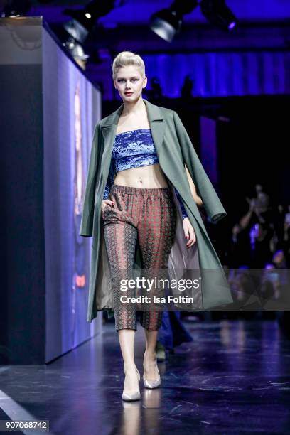 Model walks the runway during the Maybelline Show 'Urban Catwalk - Faces of New York' at Vollgutlager on January 18, 2018 in Berlin, Germany.