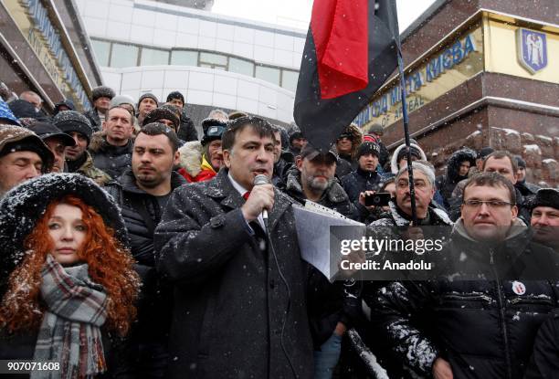 Former Georgian President and ex-governor of the Odessa region of Ukraine Mikheil Saakashvili delivers a speech to his supporters after a court...