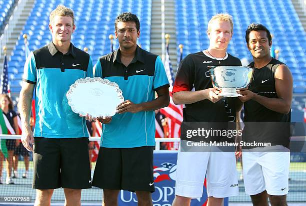 Mark Knowles of the Bahamas, Mahesh Bhupathi of India, Lukas Dlouhy of the Czech Republic and Leander Paes of India pose with the championship...