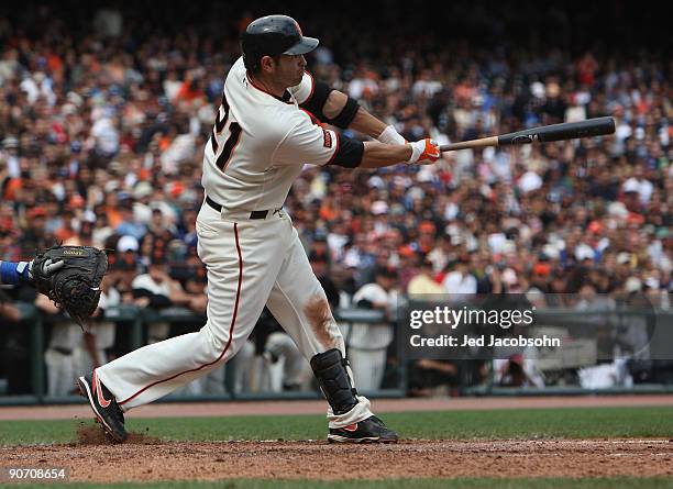 Freddie Sanchez of the San Francisco Giants hits a two run single in the sixth inning against the Los Angeles Dodgers during a Major League Baseball...
