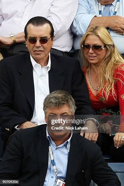 Chazz Palminteri , wife Gianna , and Alec Baldwin watch the men's semi-final during day fourteen of the 2009 U.S. Open at the USTA Billie Jean King...