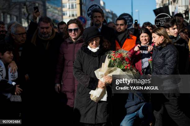 Rakel Dink , wife of slain journalist Hrant Dink, stands in front of the offices of Armenian weekly newspaper "Agos" during a rally commemorating...