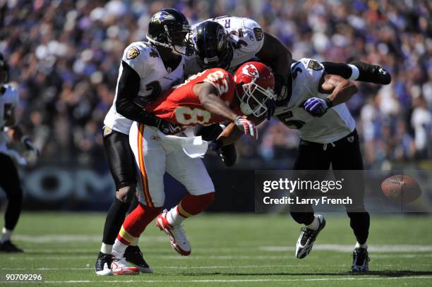 Mark Bradley of the Kansas City Chiefs loses the ball after his forward movement was stopped and the play blown dead during the game against the...