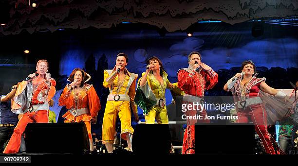Members of the London cast of Mamma Mia! perform on stage at 'Thank You For The Music' at Hyde Park on September 13, 2009 in London, England.