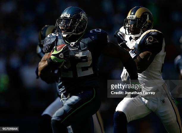 Julius Jones runs for a touchdown against the Seattle Seahawks of the St. Louis Rams at Qwest Field on September 13, 2009 in Seattle, Washington.