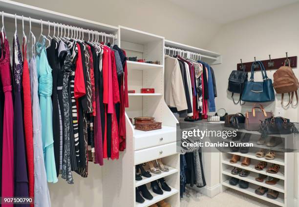 a woman's closet - walk in closet stock pictures, royalty-free photos & images