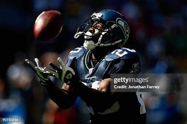 Justin Forsett of the Seattle Seahawks catches a punt against the St. Louis Rams at Qwest Field on September 13, 2009 in Seattle, Washington.