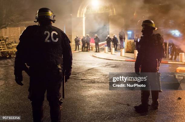 Wooden palettes burn as prison guards block access to Fresnes prison on January 19, 2018 to demand tighter security. French prison officers blocked...