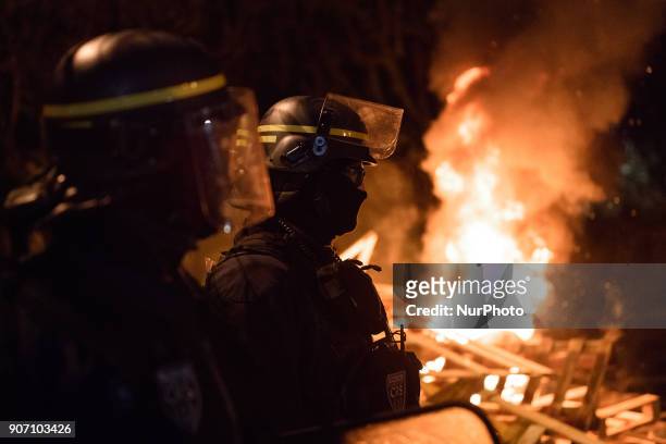 Wooden palettes burn as prison guards block access to Fresnes prison on January 19, 2018 to demand tighter security. French prison officers blocked...