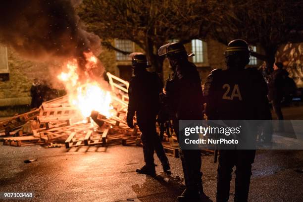 Wooden palettes burn as prison guards block access to Fresnes prison on January 19, 2018 to demand tighter security. French prison officers blocked...