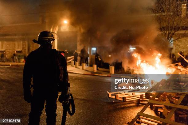 Wooden palettes burn as prison guards block access to Fresnes prison on January 19, 2018 to demand tighter security. French prison officers blocked...