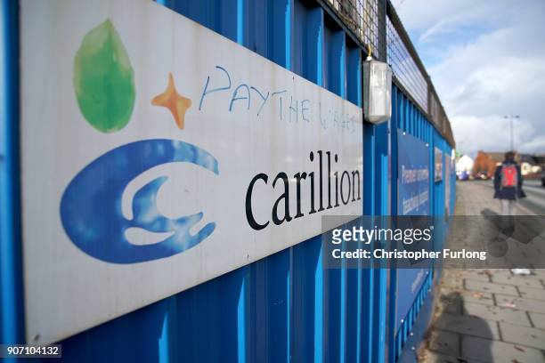 Defaced branding is seen outside Carillion's Royal Liverpool Hospital site which is being built by the construction company on January 19, 2018 in...