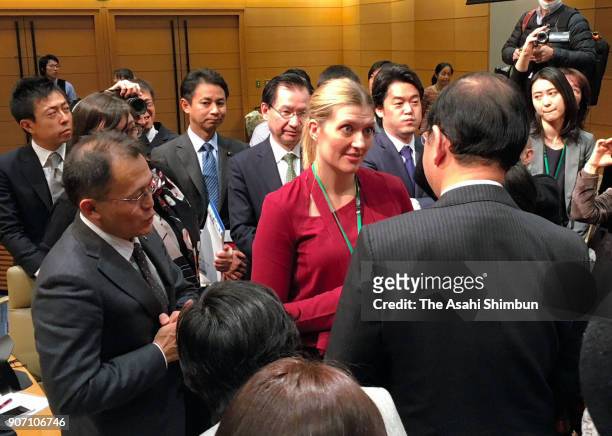 International Campaign to Abolish Nuclear Weapons executive director Beatrice Fihn talks with Japanese Communist Party chief Kazuo Shii after the...