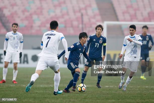 Inoue Shion of Japan in action during AFC U23 Championship Quarter-final between Japan and Uzbekistan at Jiangyin Sports Center on January 19, 2018...