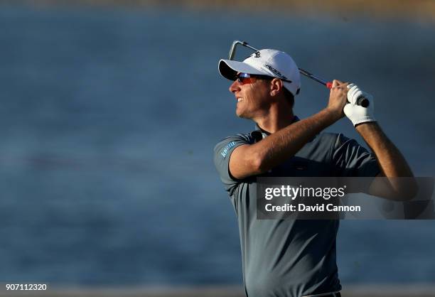 Nicolas Colsaerts of Belgium plays his second shot on the 16th hole during the second round of the 2018 Abu Dhabi HSBC Golf Championship at the Abu...