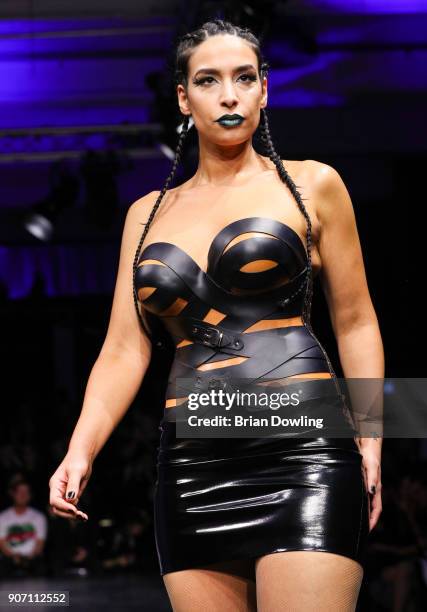 Lamiya Slimani walks the runway during the Maybelline Show 'Urban Catwalk - Faces of New York' at Vollgutlager on January 18, 2018 in Berlin, Germany.