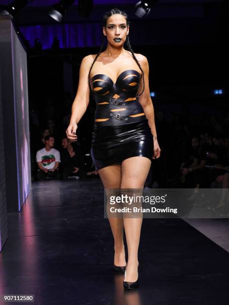 Lamiya Slimani walks the runway during the Maybelline Show 'Urban Catwalk - Faces of New York' at Vollgutlager on January 18, 2018 in Berlin, Germany.