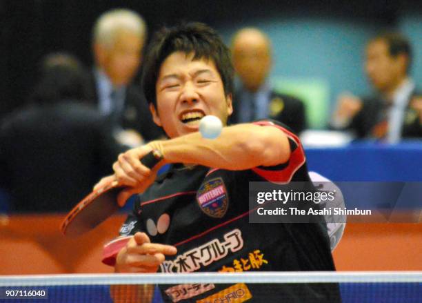 Jun Mizutani competes in the Men's Singles 4th round during day five of the All Japan Table Tennis Championships at the Tokyo Metropolitan Gymnasium...