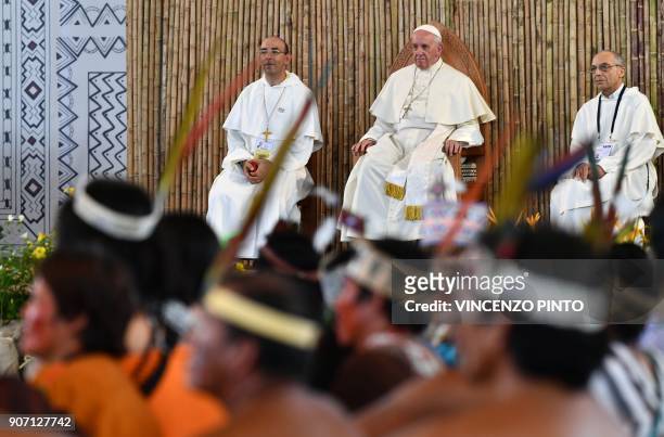 Pope Francis attends a meeting with representatives of indigenous communities of the Amazon basin from Peru, Brazil and Bolivia, in the Peruvian city...