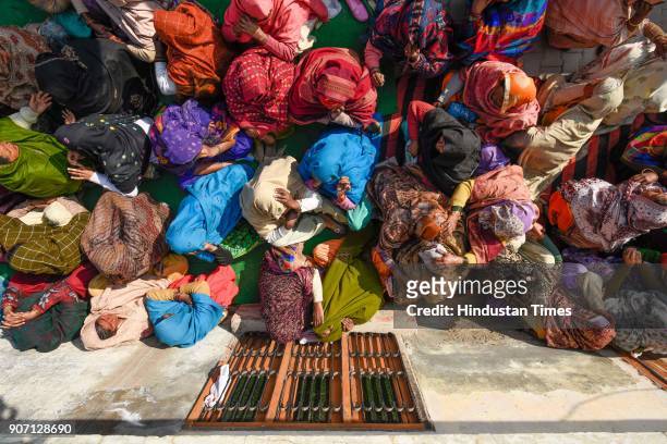 Family members of 12th class student mourn on his death at their village in Jhansa, on January 19, 2018 in Kurukshetra, India. A Class 12 student,...