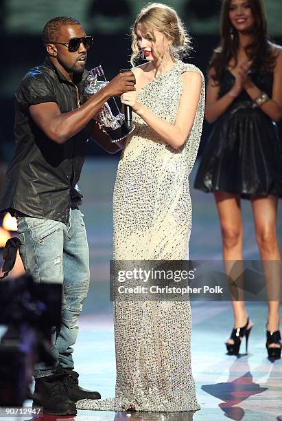 Kanye West jumps onstage after Taylor Swift won the "Best Female Video" award the 2009 MTV Video Music Awards at Radio City Music Hall on September...