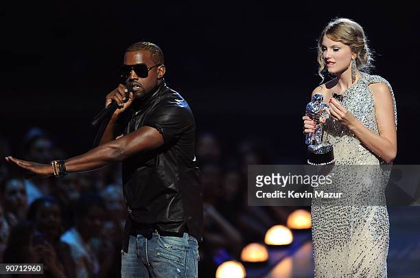 Kanye West takes the microphone from Taylor Swift and speaks onstage during the 2009 MTV Video Music Awards at Radio City Music Hall on September 13,...